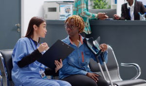 Patient talking to nurse about injury
